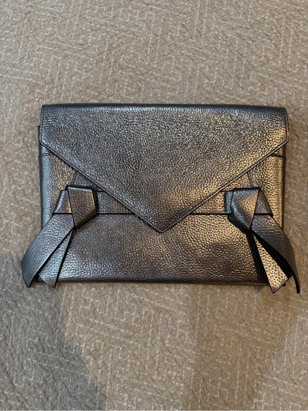 BCBGMaxAzria Metallic Pewter Envelope Clutch with Knot Tassel Accents